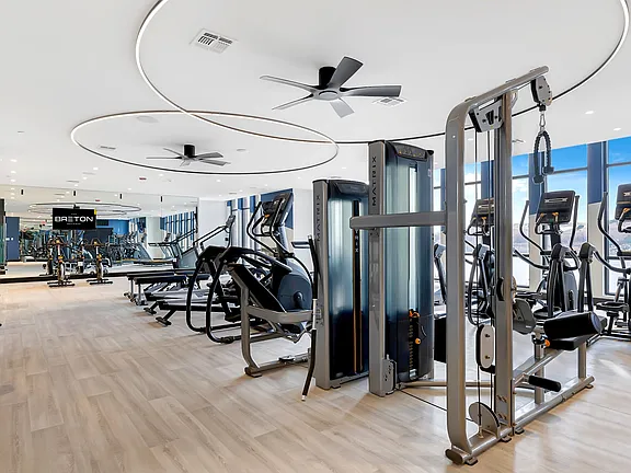 The Breton, multifamily by HH Designers in Bayonne, NJ, fitness center strength equipment