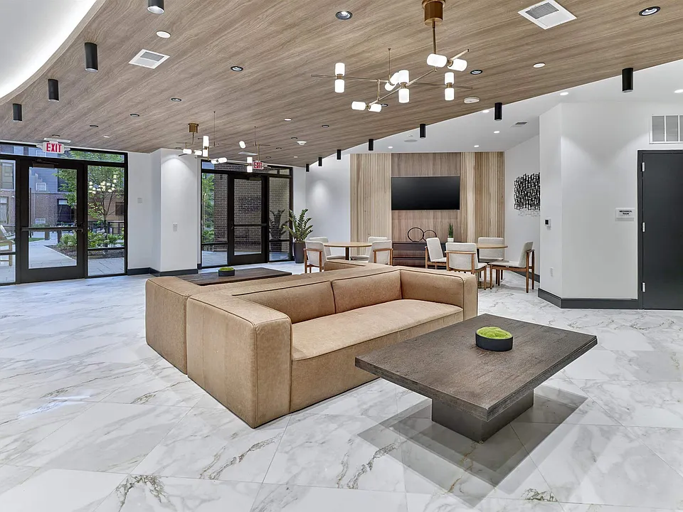 The Breton, multifamily by HH Designers in Bayonne, NJ, lobby lounge with wood ceiling