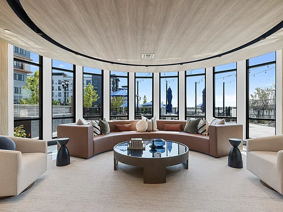 The Breton, multifamily by HH Designers in Bayonne, NJ, rotunda lounge with panoramic glass
