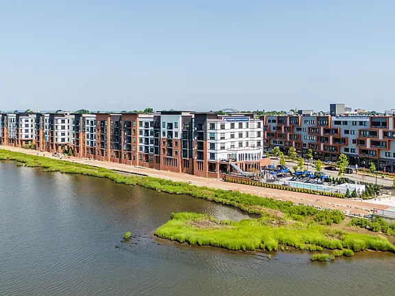 The Breton, multifamily by HH Designers in Bayonne, NJ, waterfront panorama of the community