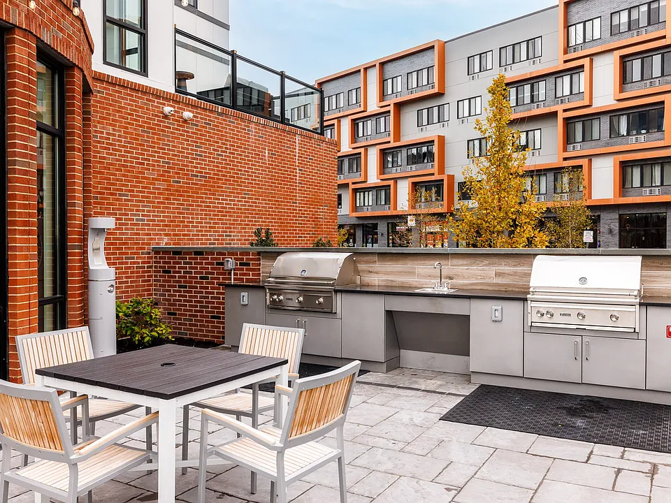The Breton, multifamily by HH Designers in Bayonne, NJ, terrace grilling stations