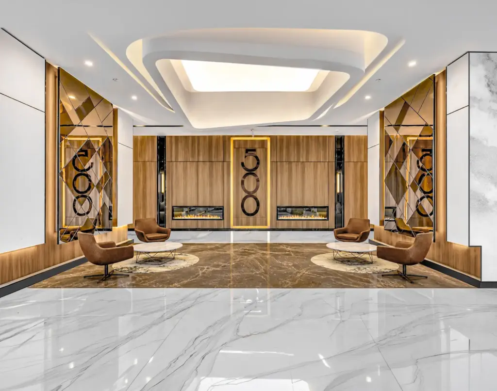 500 BOTA lobby with marble floors and dual fireplaces, interior design by HH Designers in Lakewood, NJ